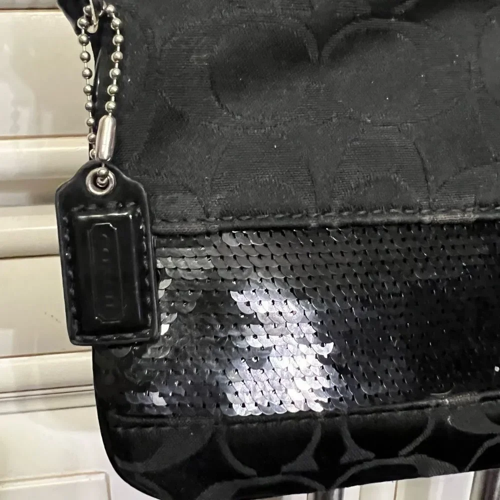 coach signature large flat sequin wristlet bag
